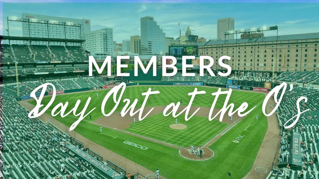 "Baseball stadium with a city skyline backdrop, empty seats, and a field ready for play. Text overlay reads 'Members Day Out at the O's' in bold and script fonts."